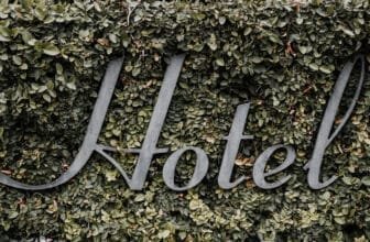 Hotel Sign in Vines