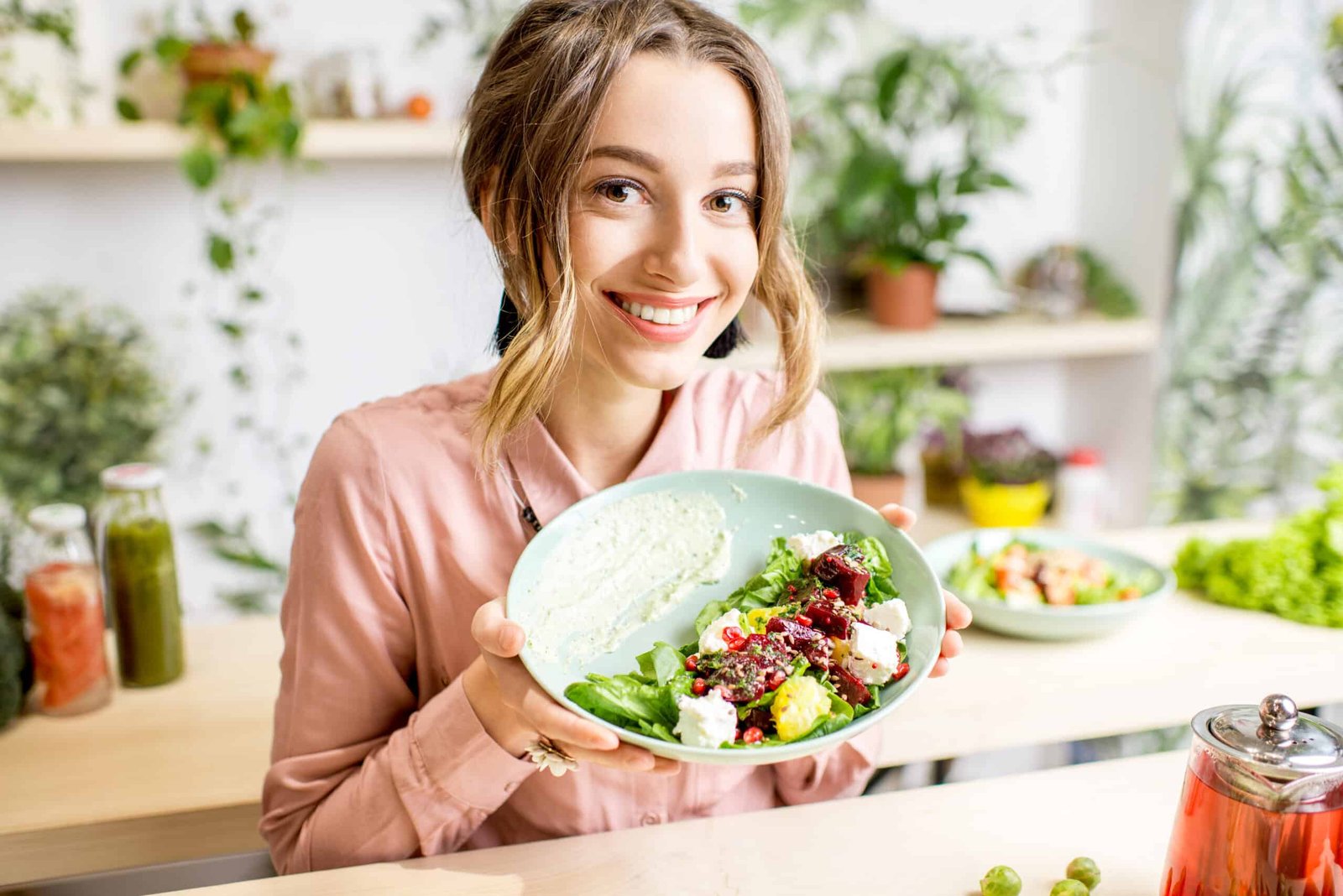 Woman portrait with healthy green food