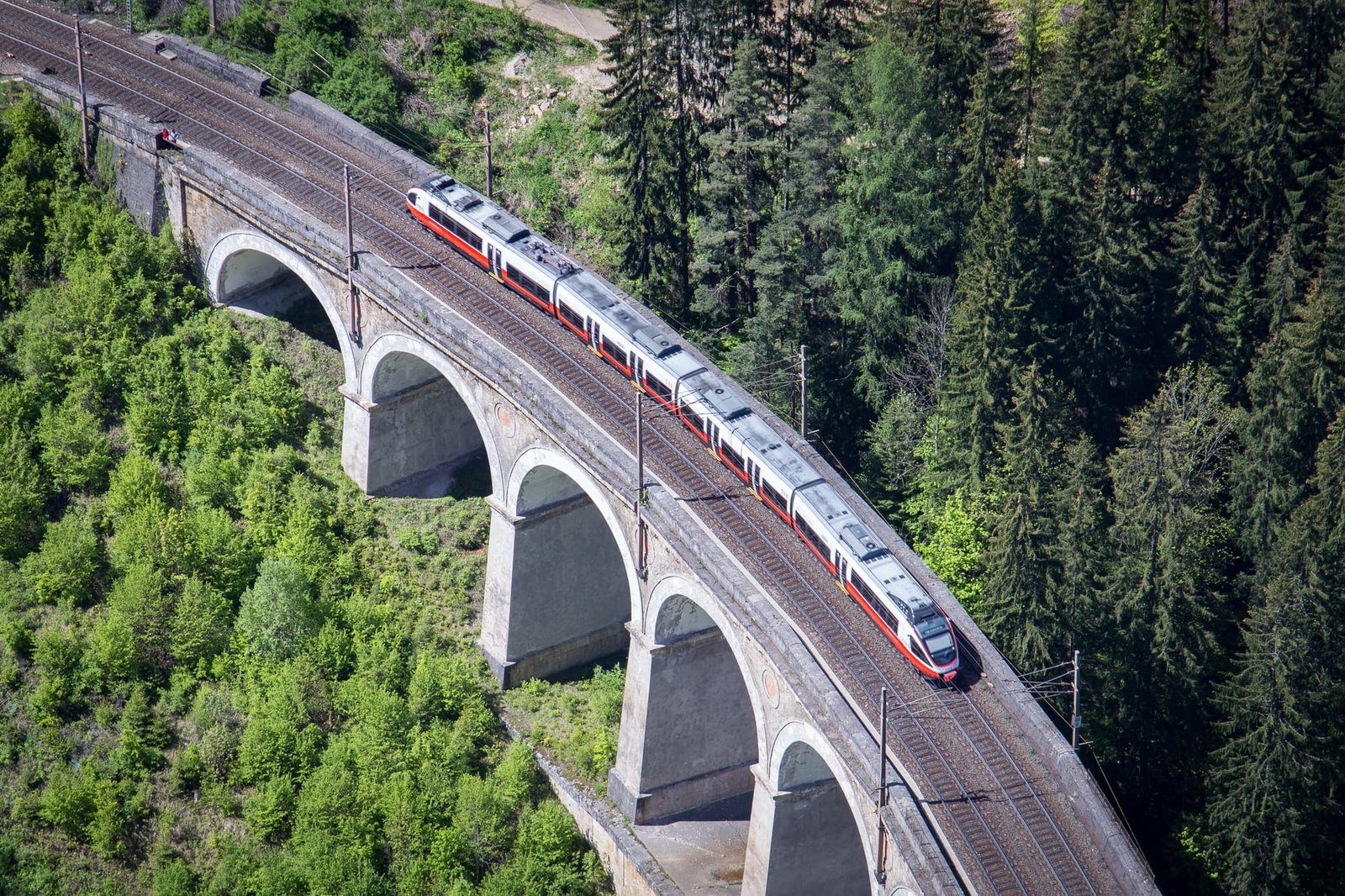 Train on historic Semmering railway vaiduct bridge