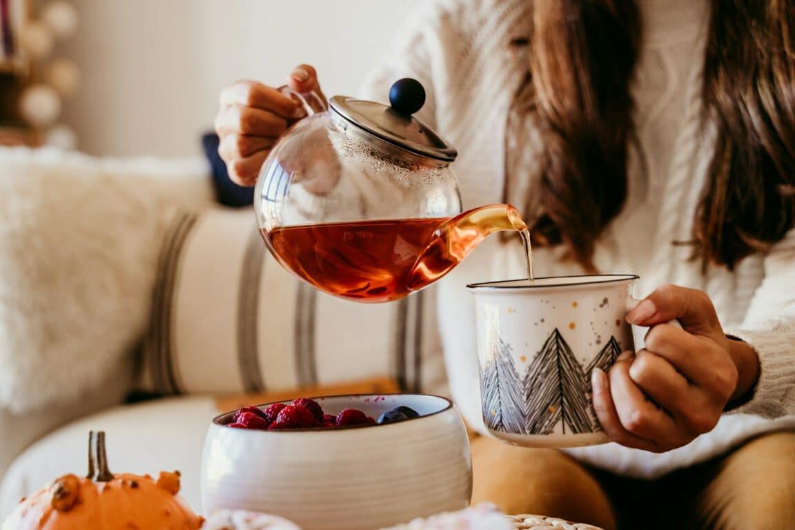 woman having a cup of tea at home during breakfast.Healthy breakfast with fruits.lifestyle