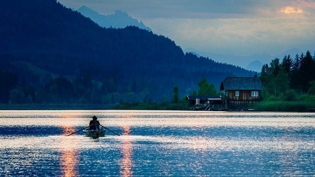 weissensee, carinthia, fisherman